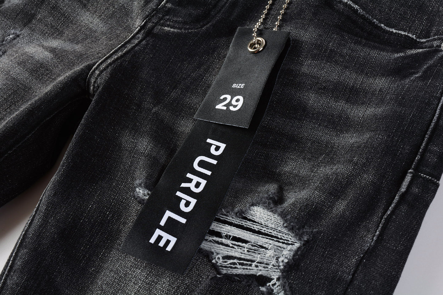 Purple jeans Black tag