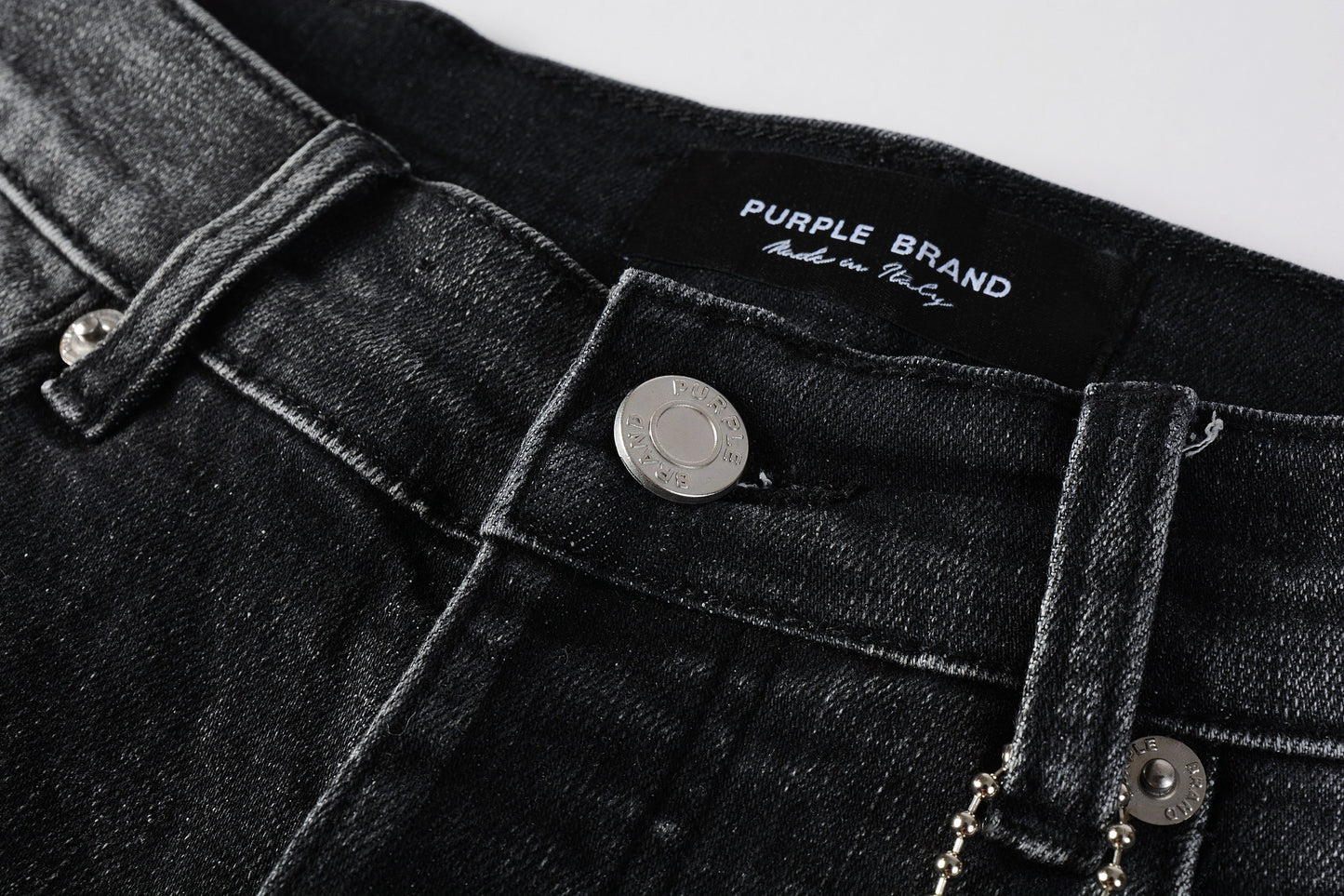 Purple jeans Black tag